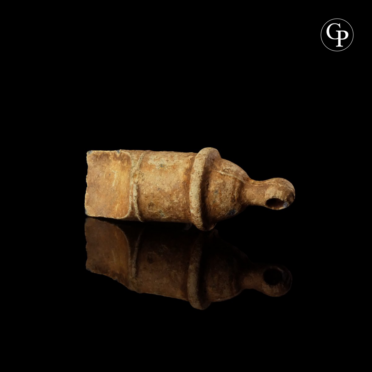 Ancient Roman lead whistle (sifflet en plomb) from a legionary, 1st-3rd century AD. Rare military artifact with characteristic cylindrical body and mouthpiece. | Sifflet en plomb romain antique, légionnaire, Ier-IIIe siècle apr. J.-C. Rare artefact militaire à corps cylindrique et embouchure caractéristique.