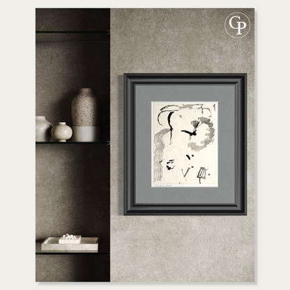 Hanna Ben-Dov original ink painting with a black frame and grey mat on a textured concrete wall next to a modern shelf with ceramics | Peinture originale à l'encre de Hanna Ben-Dov avec cadre noir et passe-partout gris sur un mur en béton texturé à côté d'une étagère de céramiques
