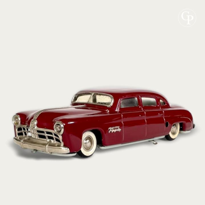 TippCo Hudson Limousine rouge Burundi vue trois-quarts avant calandre chromée c.1948 US Zone Germany | Vintage TippCo Hudson Limousine tin toy car front three-quarter view Burundi red lacquer c.1948 US Zone Germany